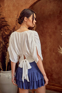 White Smocked Top With Back Bow